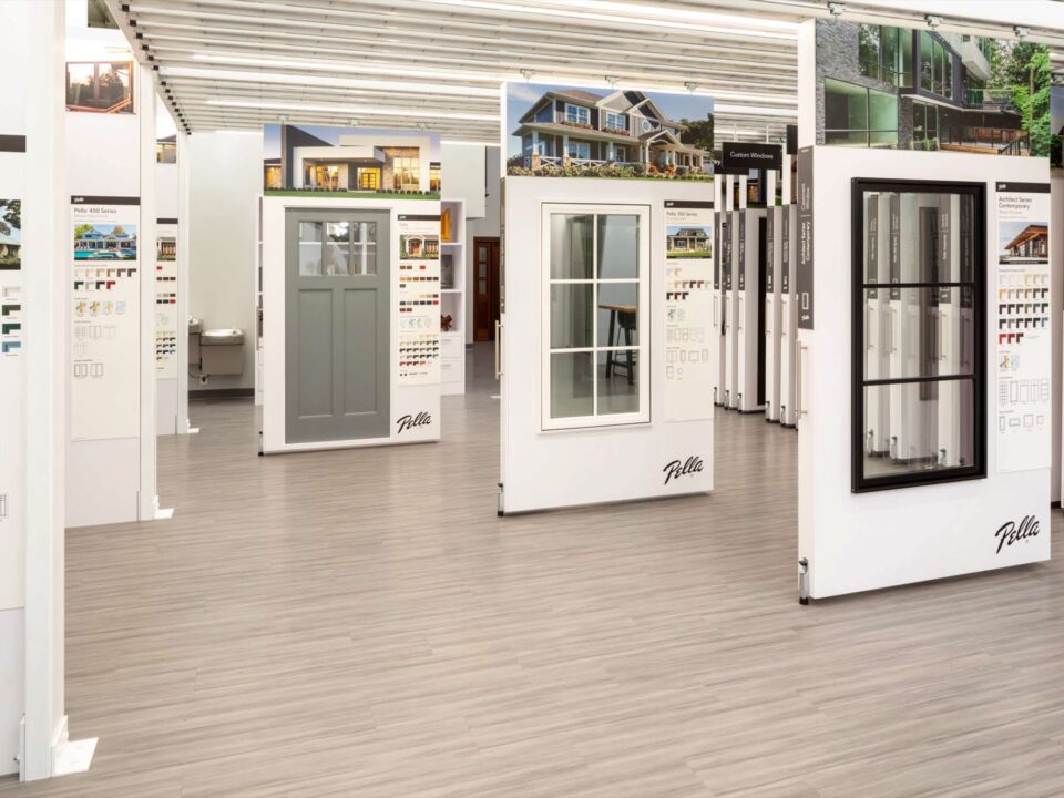 Free standing windows and doors being displayed on roller racks