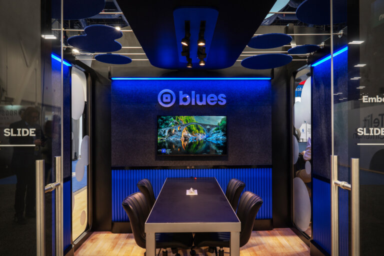 Blues meeting room inside their trade show booth at CES 2025