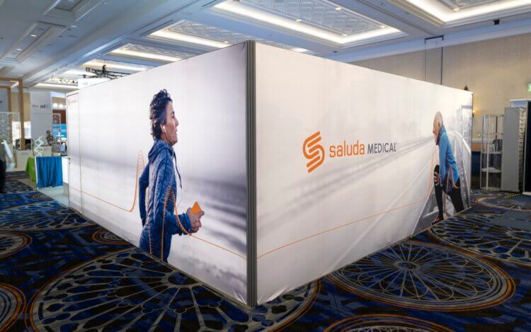 Boxed in convention area with Saluda Medical branding