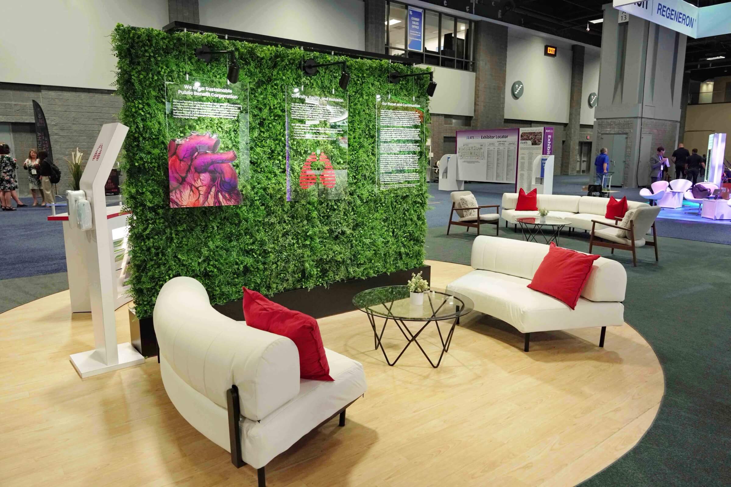 Seating area in front of a vegetation wall in an event