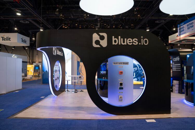 Blues.io exhibit booth at a convention
