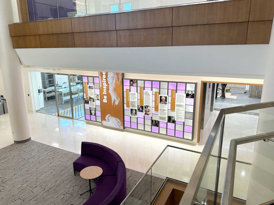 Image of a wall in the University of Saint Thomas celebrating the donor Guy Schoenecker