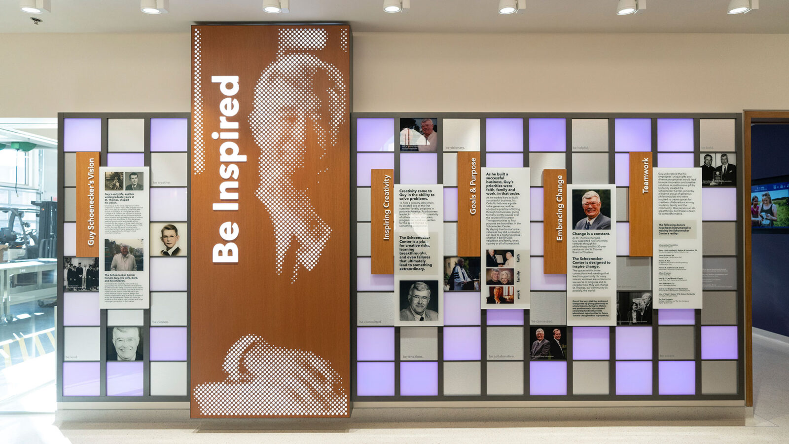 Image of a wall in the University of Saint Thomas celebrating the donor Guy Schoenecker