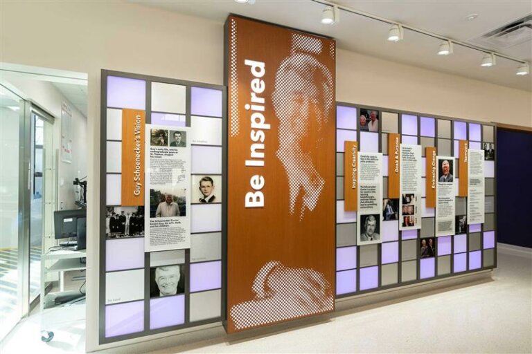 Image of a wall in the University of Saint Thomas celebrating the donor Guy Schoenecker